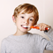 Young boy brushing teeth
